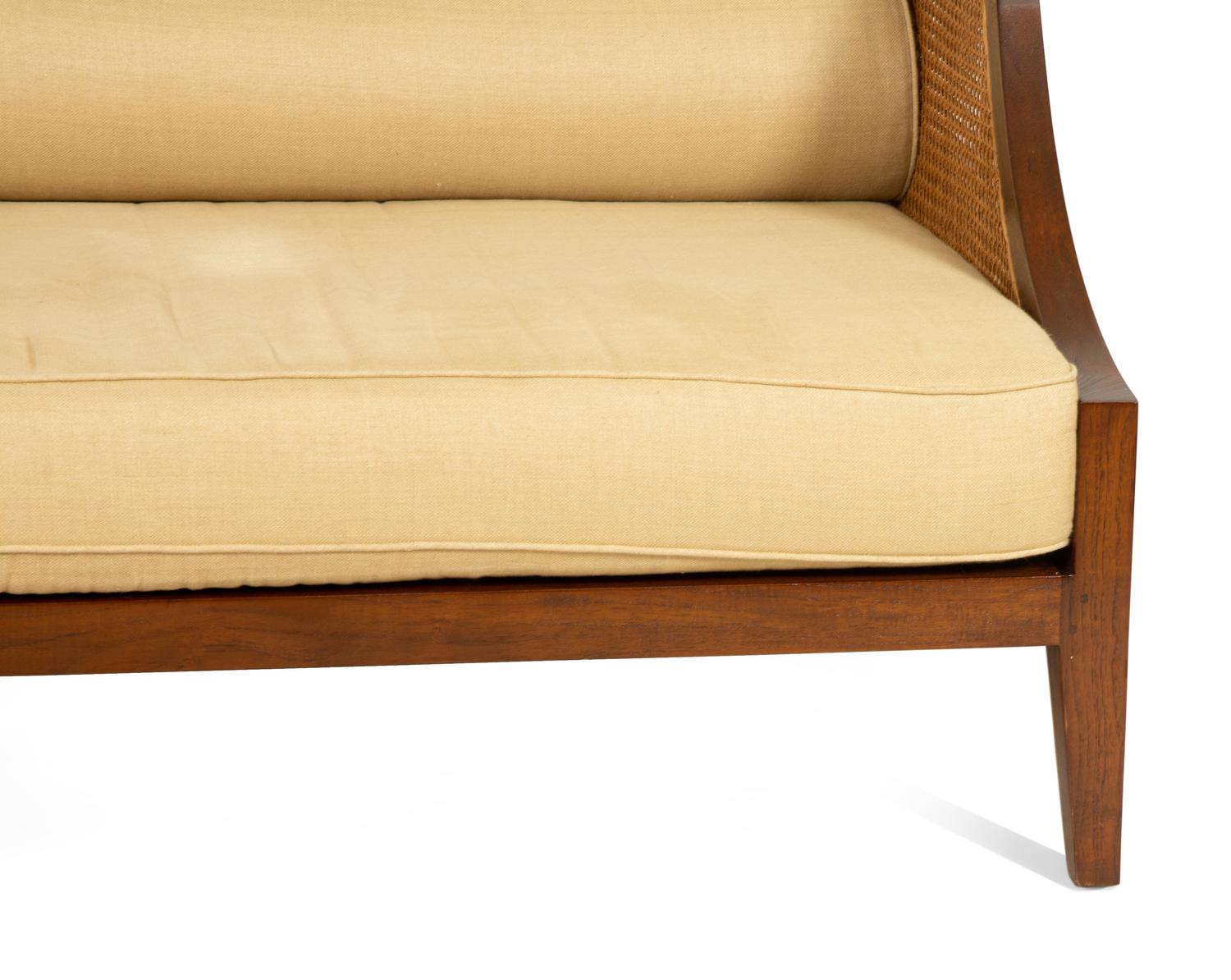 A Contemporary Walnut and Cane Daybed