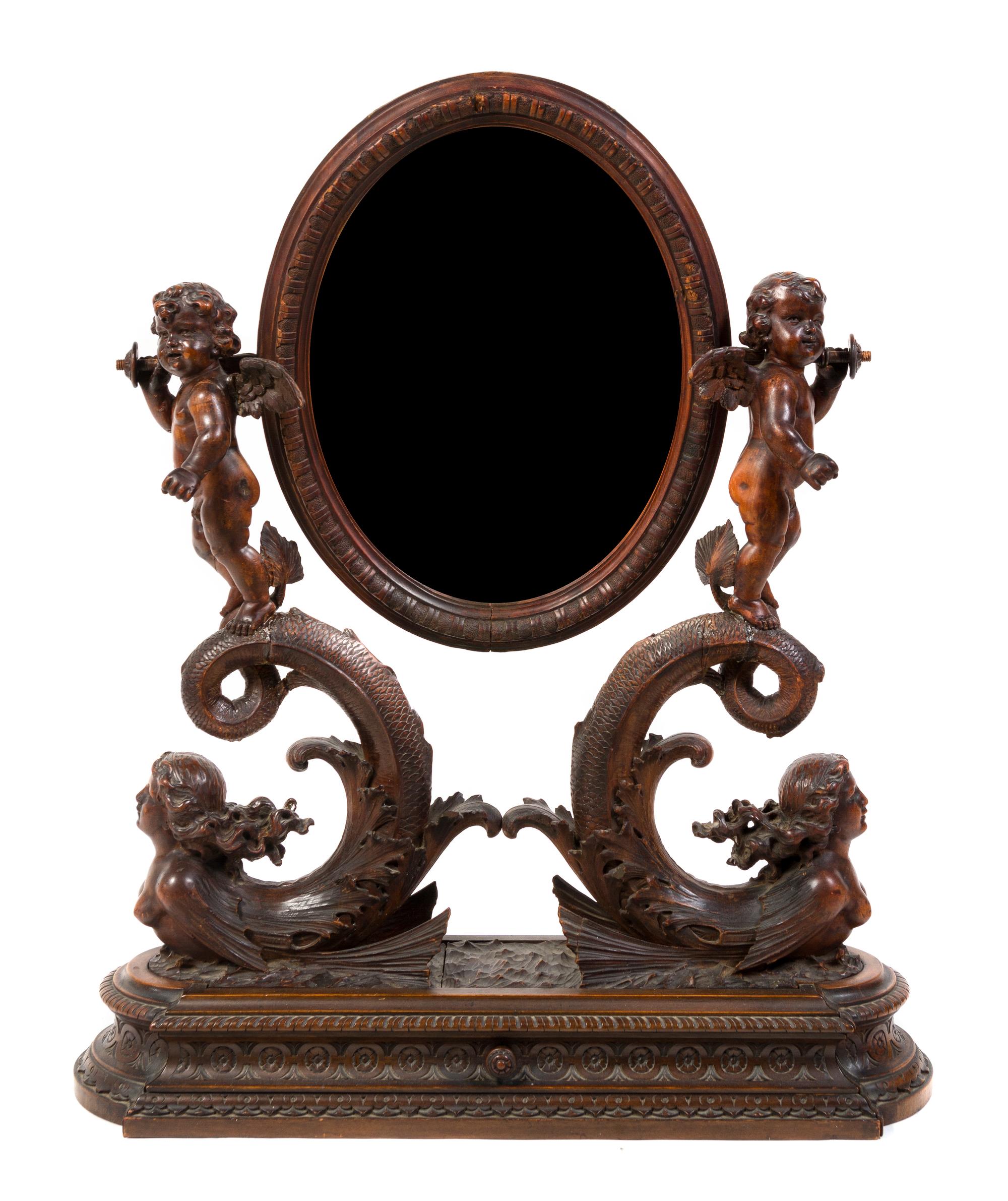 A Venetian Carved Walnut Dressing Mirror, Height 32 3/8 x width 25 1/2 inches.