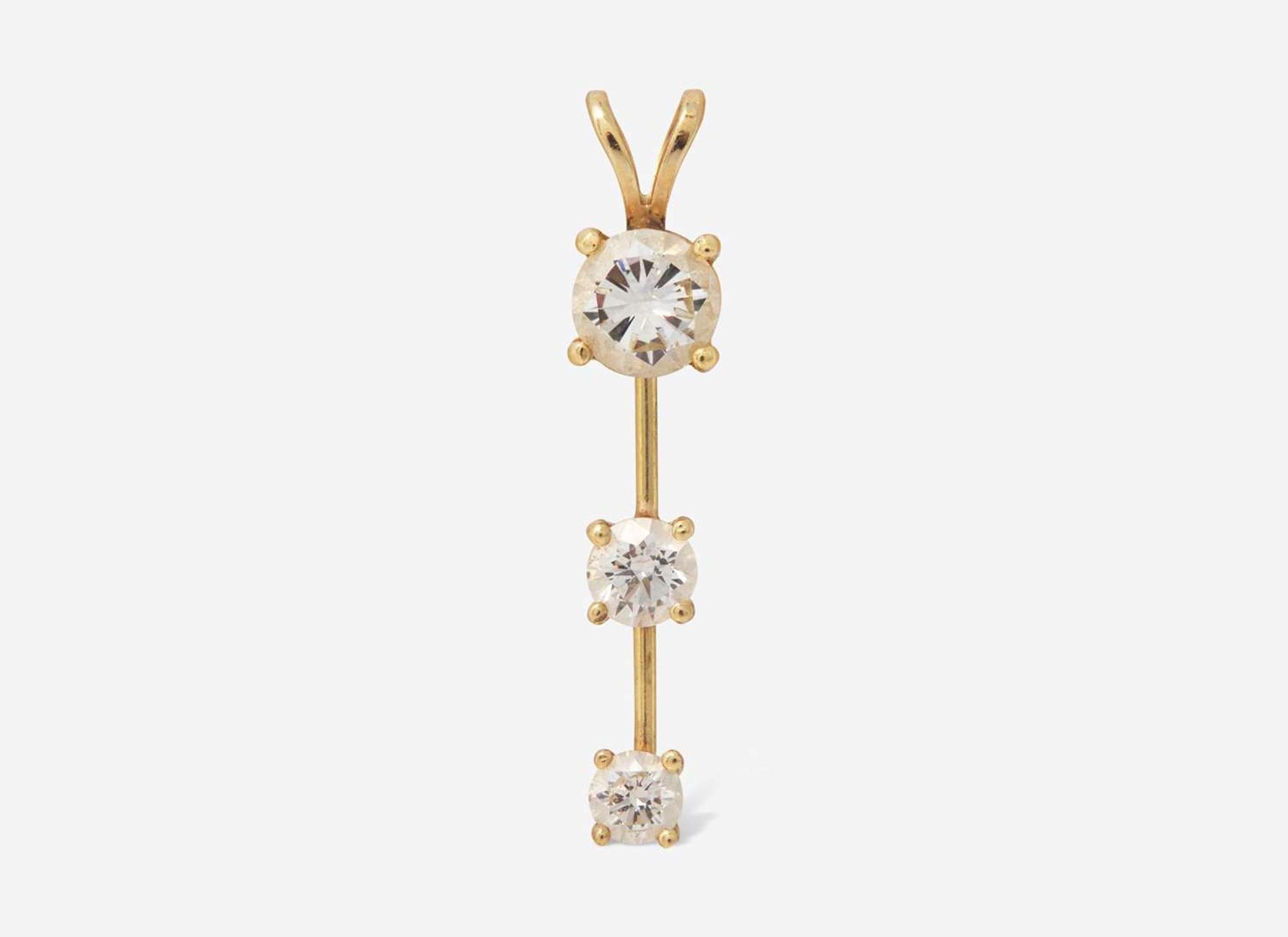 A 14K Yellow Gold and Diamond Pendant