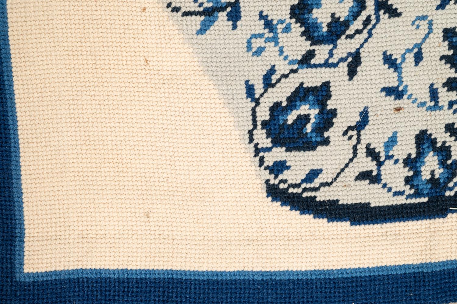 A Needlepoint Wool Rug