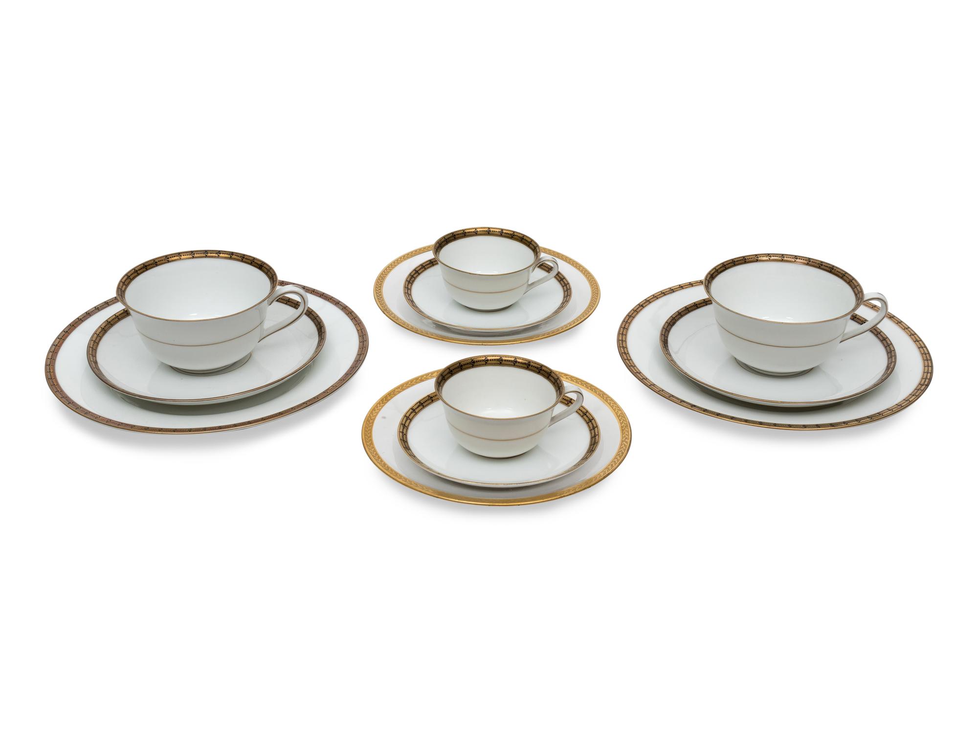 A Collection of Hutschenreuther Cobalt and Gilt Bordered Porcelain