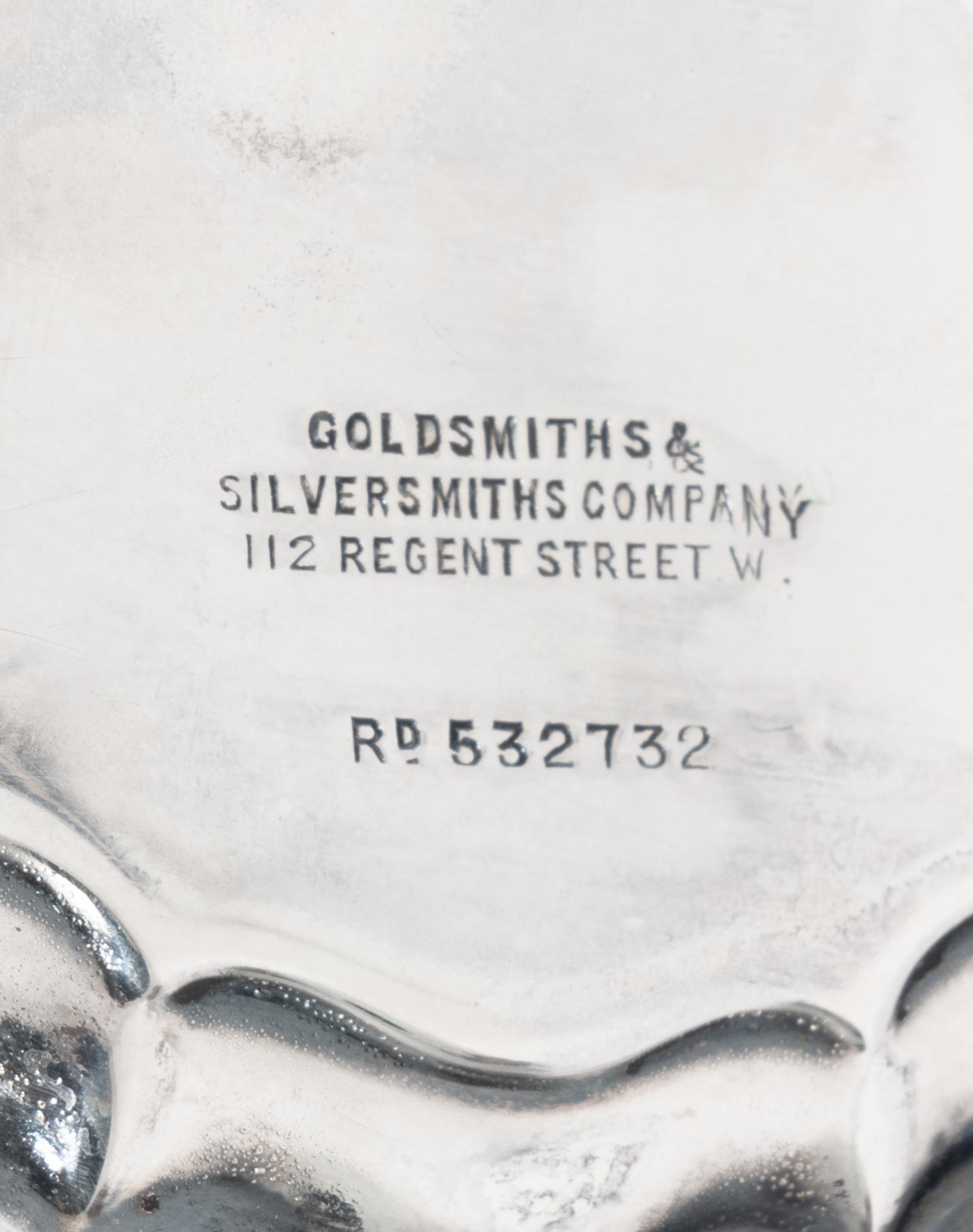 A Pair of Diminutive English Silver Center Tables