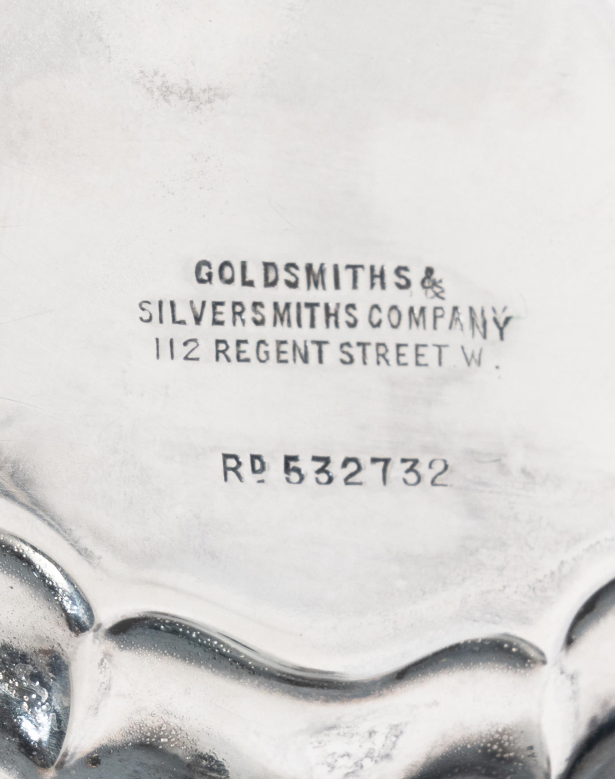 A Pair of Diminutive English Silver Center Tables