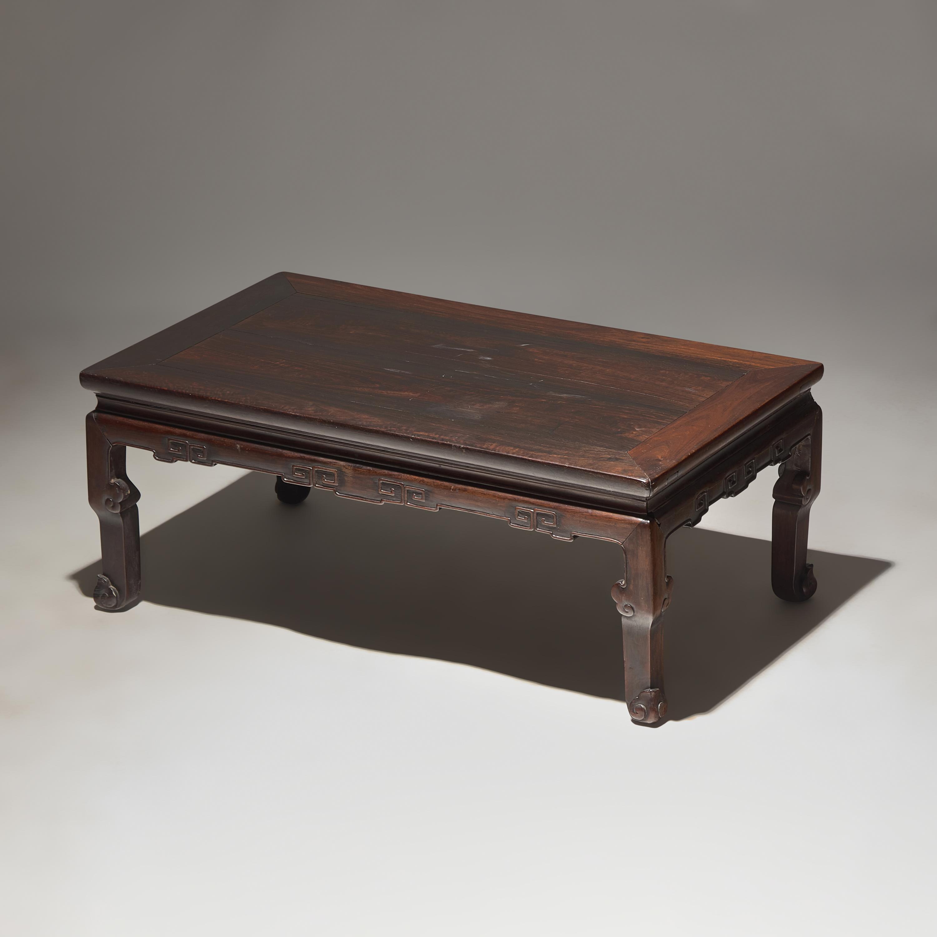 A Chinese Zitan and Mixed Hardwoods Kang Table, 19th/ Early 20th Century — 晚清/民國 紫檀拼硬木炕桌