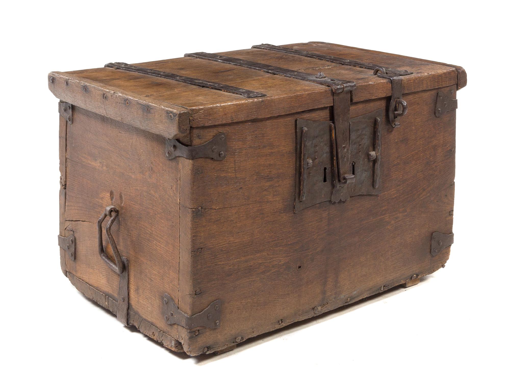 A Continental Wrought Iron Mounted Oak Strongbox Height 19 3/4 x width 33 1/4 x depth 22 inches. — 17TH CENTURY