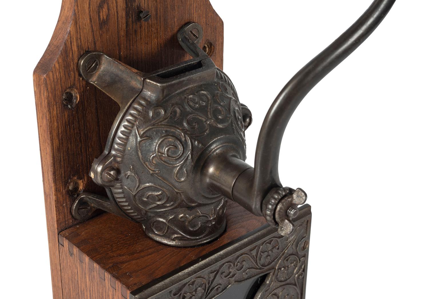 A Bell Cast Iron Wall Mount Coffee Grinder
