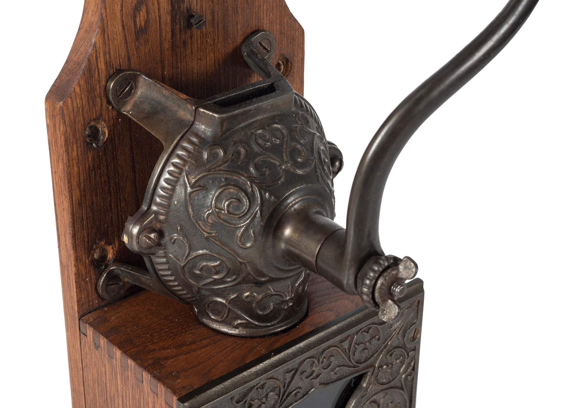 A Bell Cast Iron Wall Mount Coffee Grinder