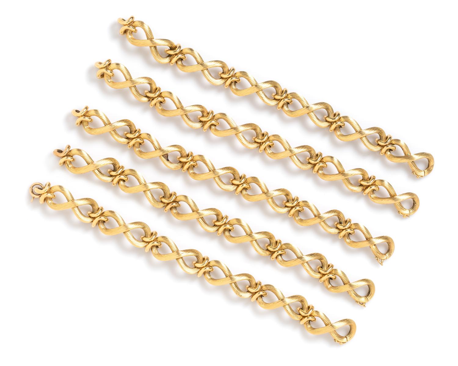 An 18 Karat Yellow Gold Convertible Longchain Necklace/Bracelet, Carlo Weingrill, 103.90 dwts.