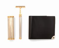 A Duhill Parcel Gilt Metal Shaving Set