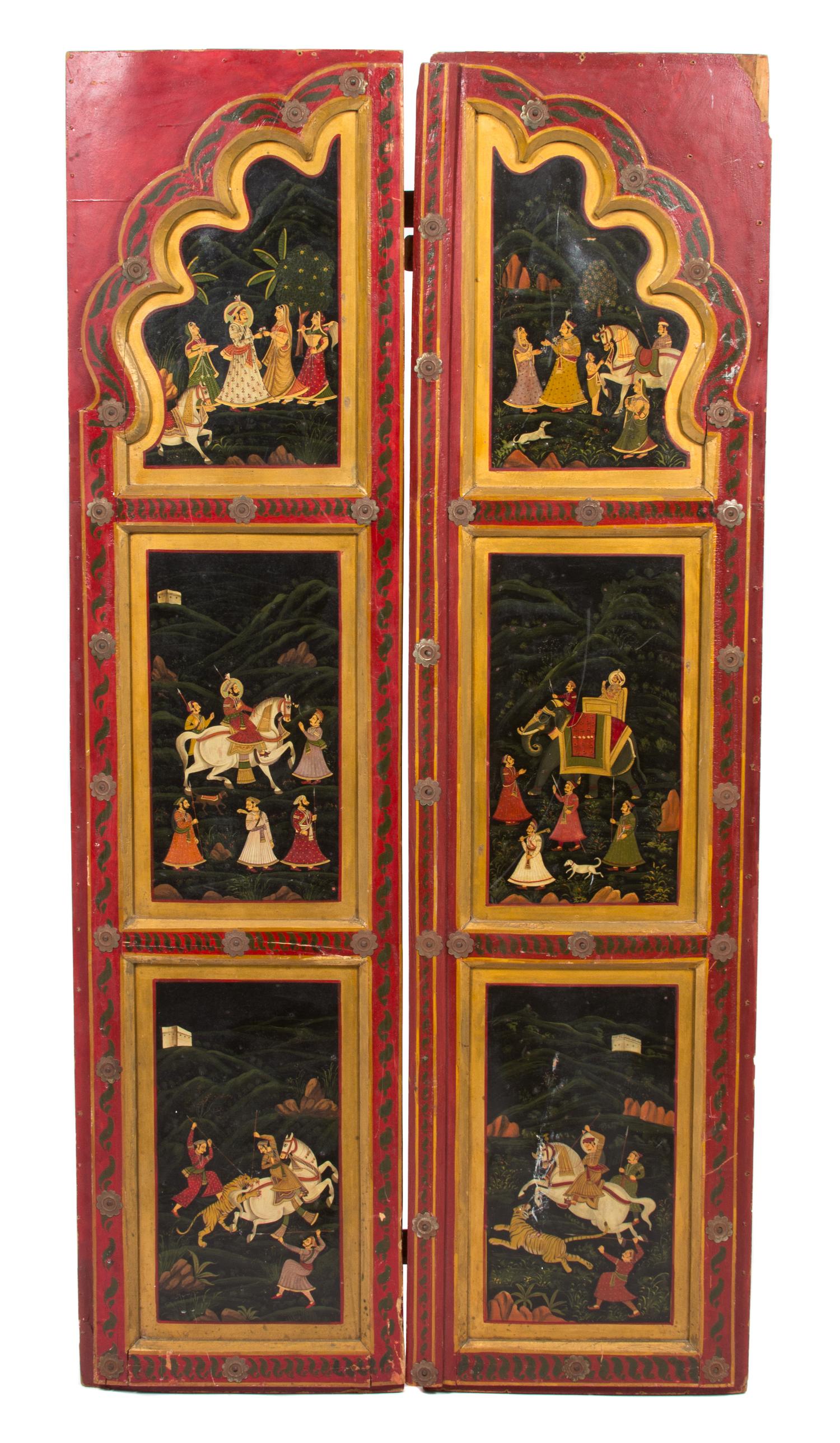 A Pair of Indian Painted and Gilt Three Panel Doors Height of each 71 x width 18 x depth 2 inches. — EARLY 20TH CENTURY