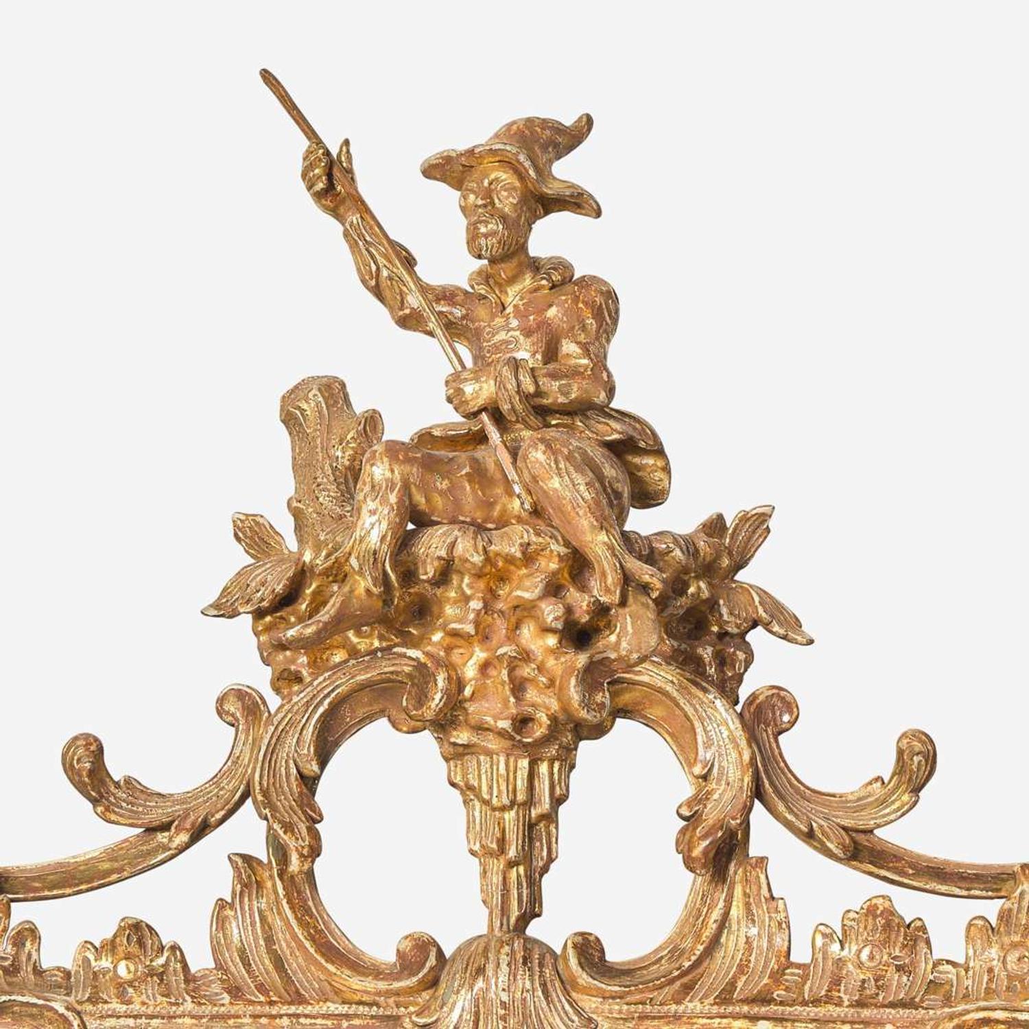 A George III Chippendale carved giltwood looking glass in the Chinese taste circa 1765