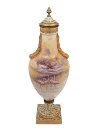 A French Painted and Parcel Gilt Porcelain Urn