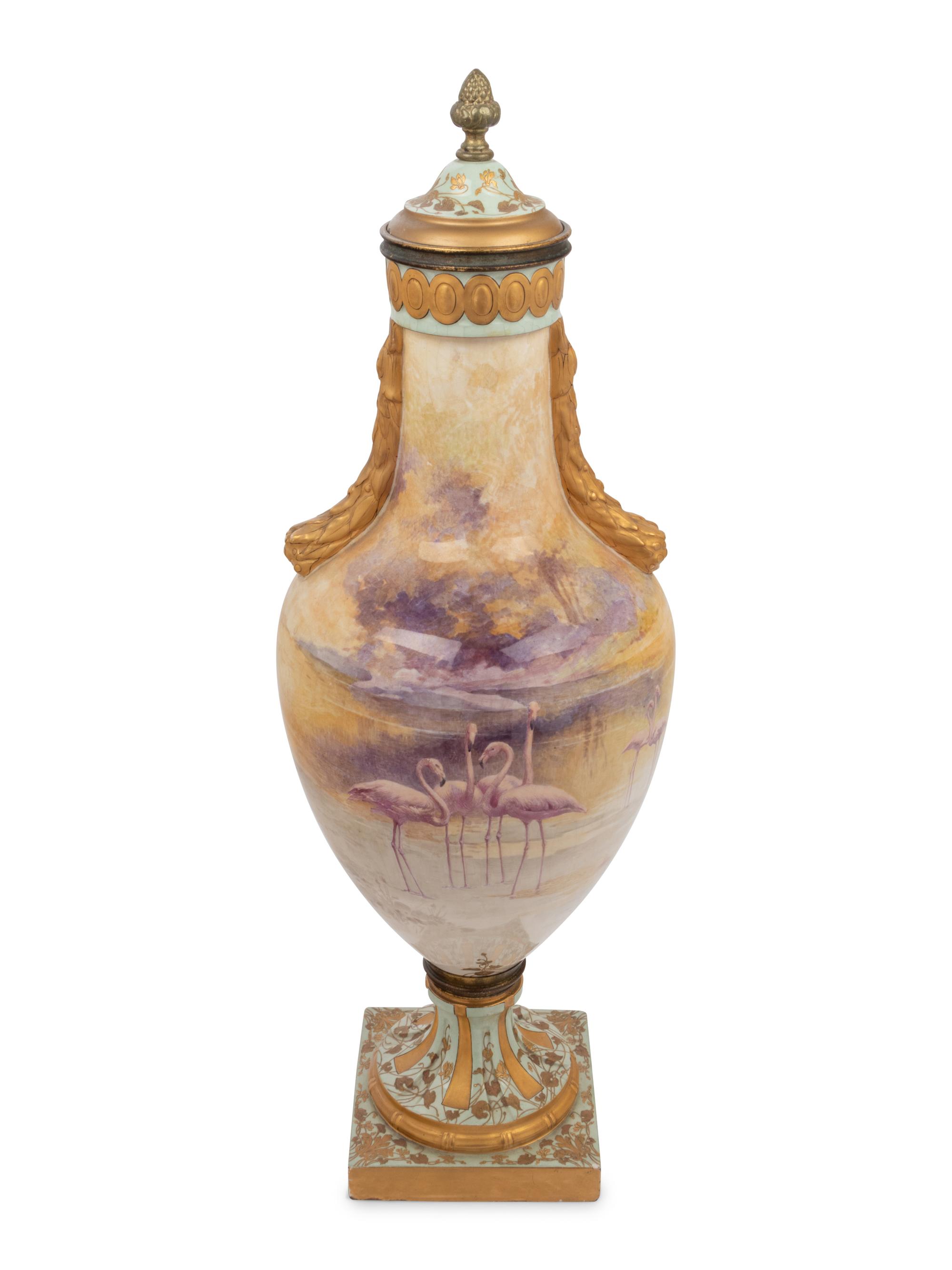 A French Painted and Parcel Gilt Porcelain Urn