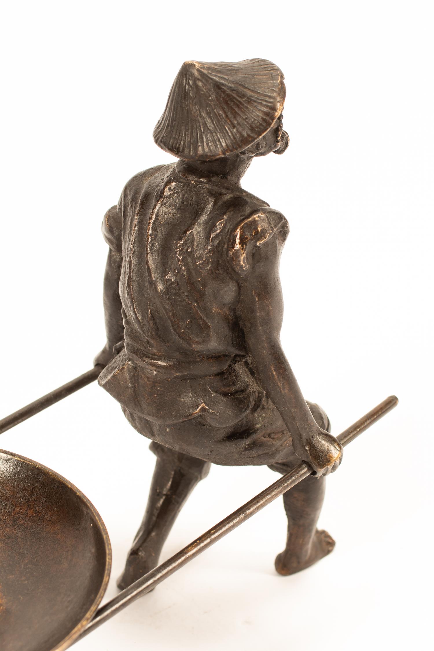 A Japanese Bronze Figural Stand