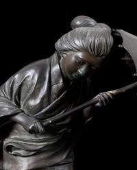 A Japanese Bronze Okimono of A Lady