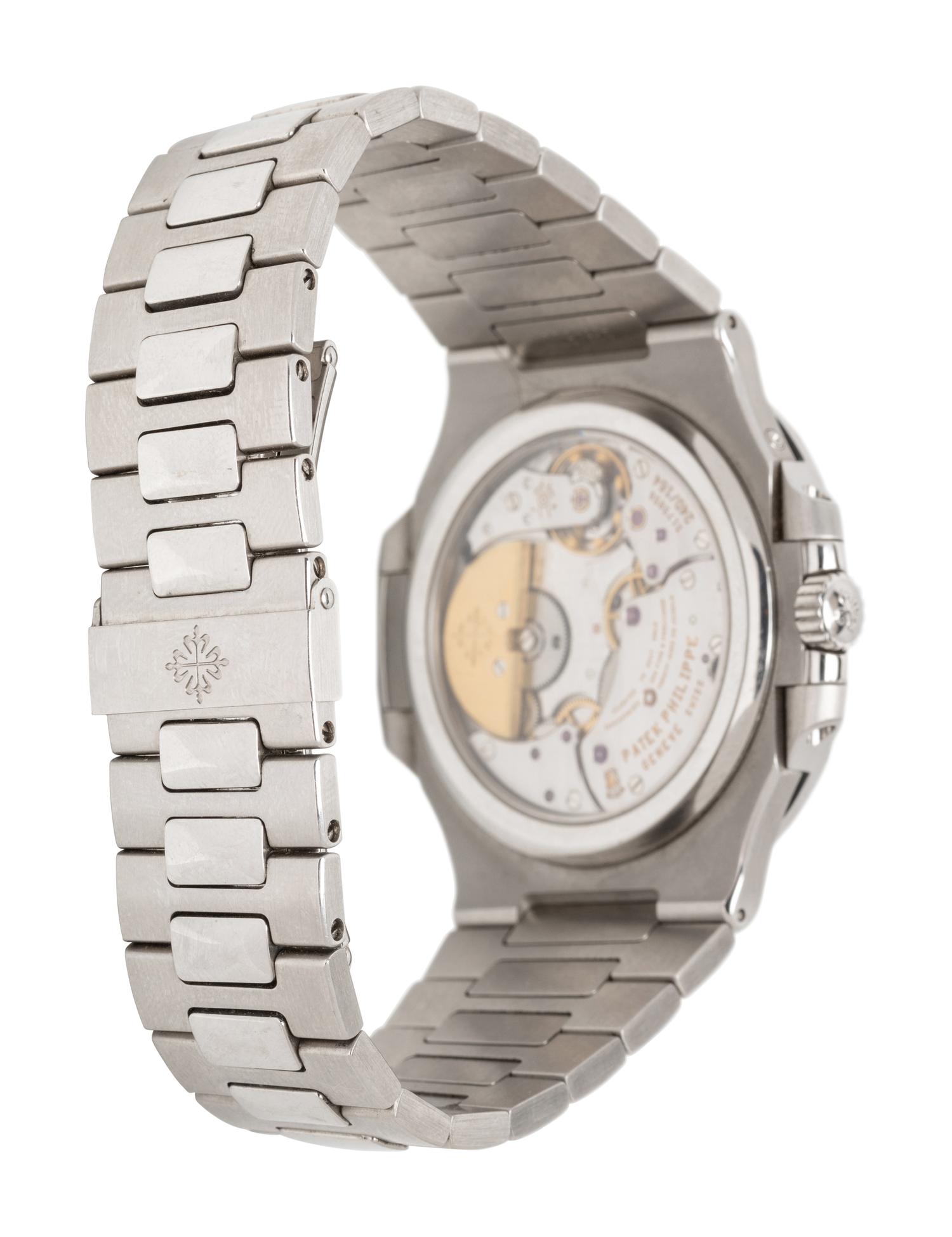 PATEK PHILIPPE, REF. 5712/1A STAINLESS STEEL 'NAUTILUS' WATCH, BOX & PAPERS