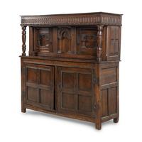 A Jacobean Carved Oak Court Cupboard