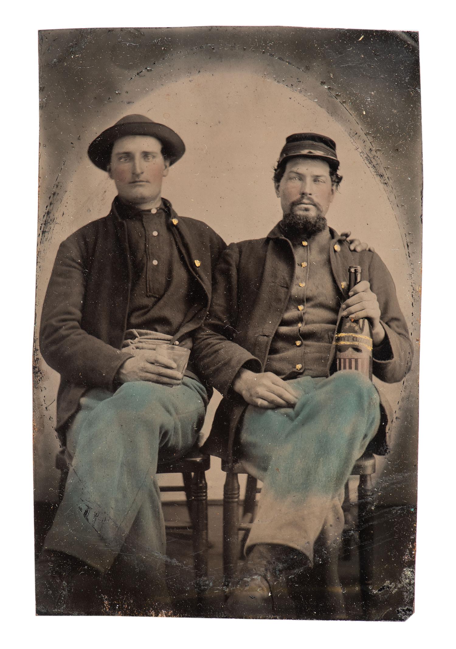 [CIVIL WAR]. Quarter plate tintype of a pair of Union pards sharing a drink.