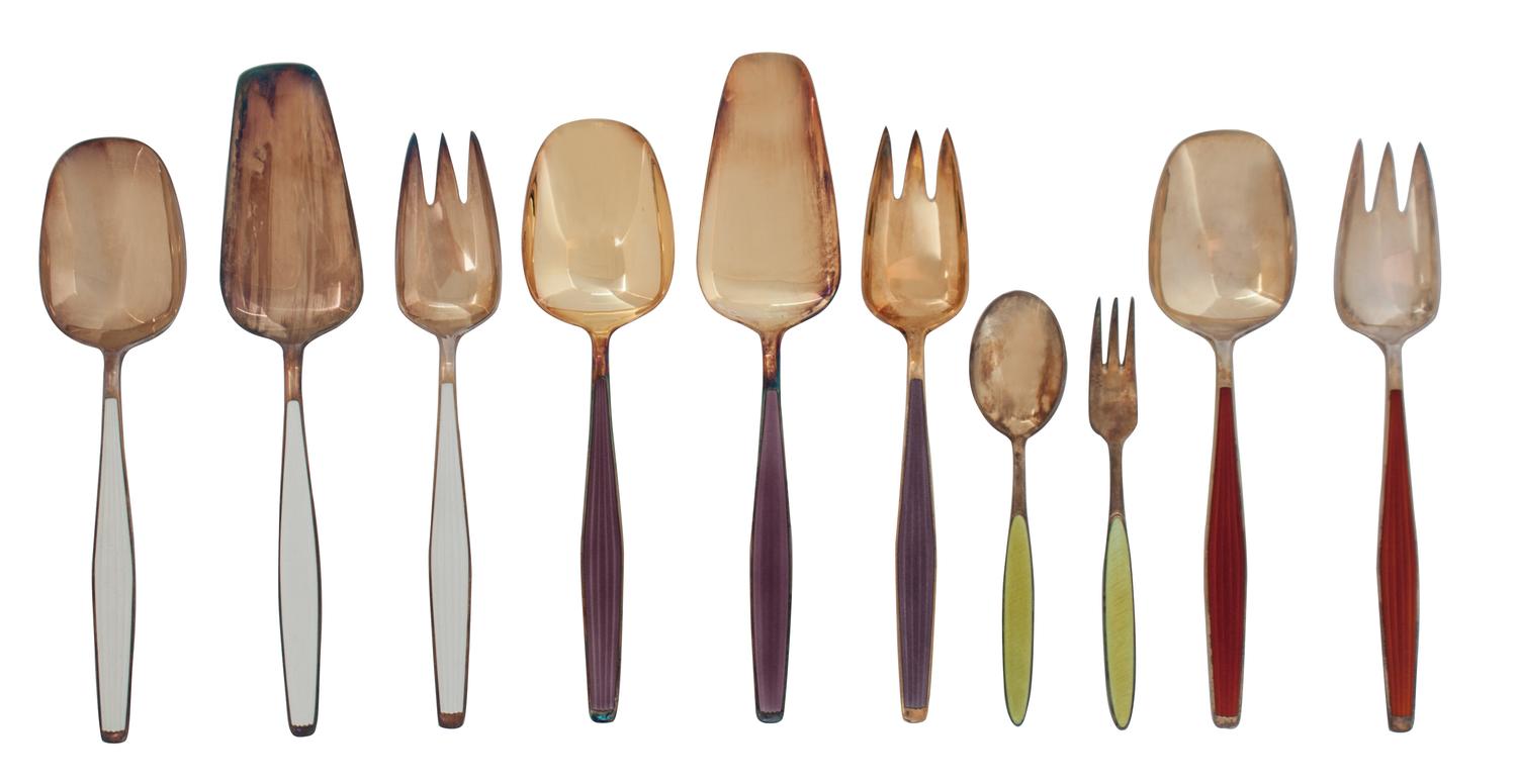 Ten Silver Gilt and Enamel Serving Pieces, J. Tostrup, Oslo, comprising a serving fork and spoon with red enamel handles; 2 serving for