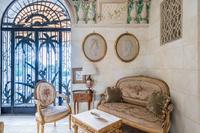 A Louis XVI Style Giltwood Three-Piece Seating Suite
