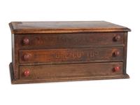 A Thomas Russell Painted Wood Spool Cabinet