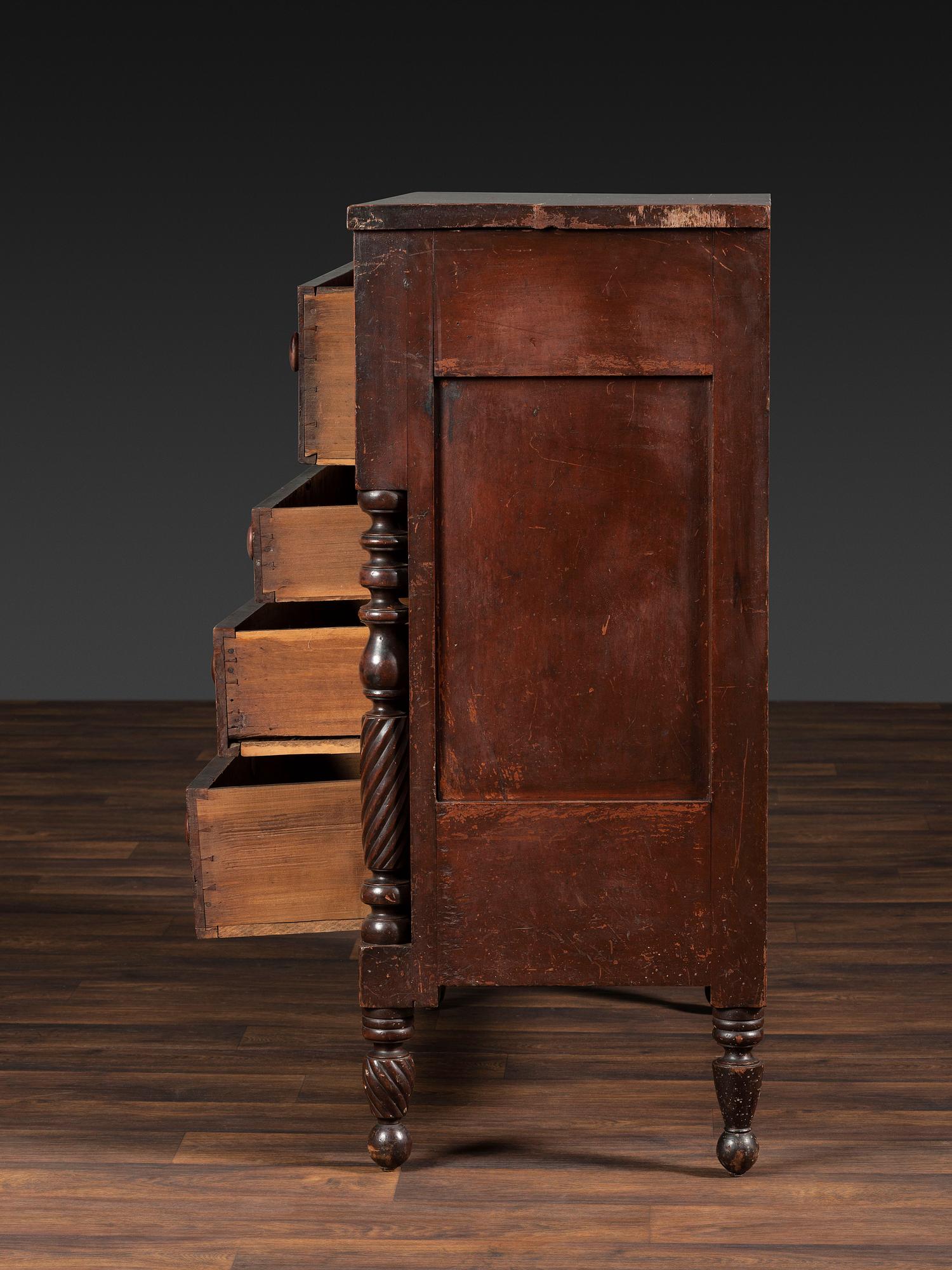 A Classical Tennessee Carved Cherrywood Chest of Drawers