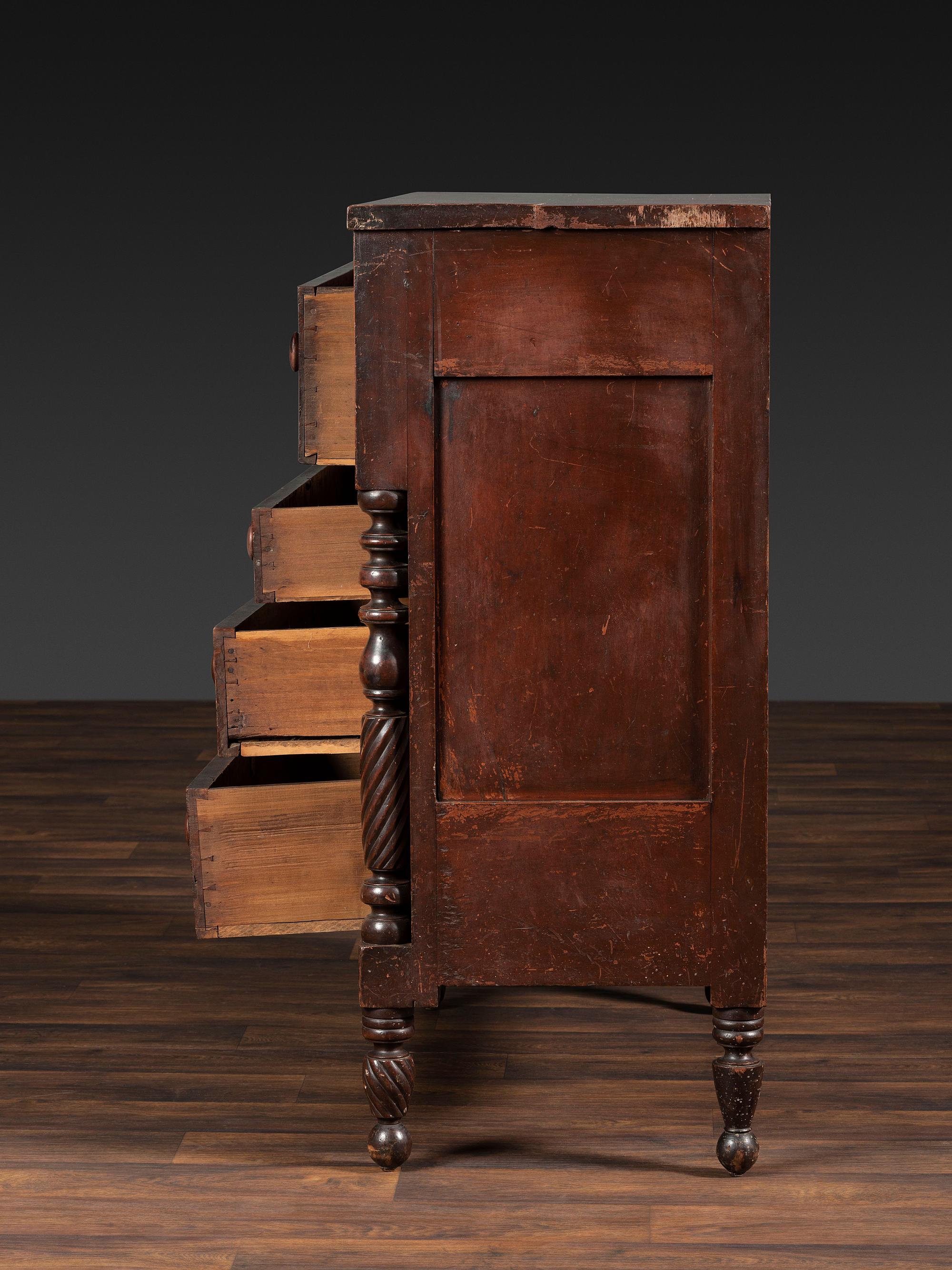 A Classical Tennessee Carved Cherrywood Chest of Drawers