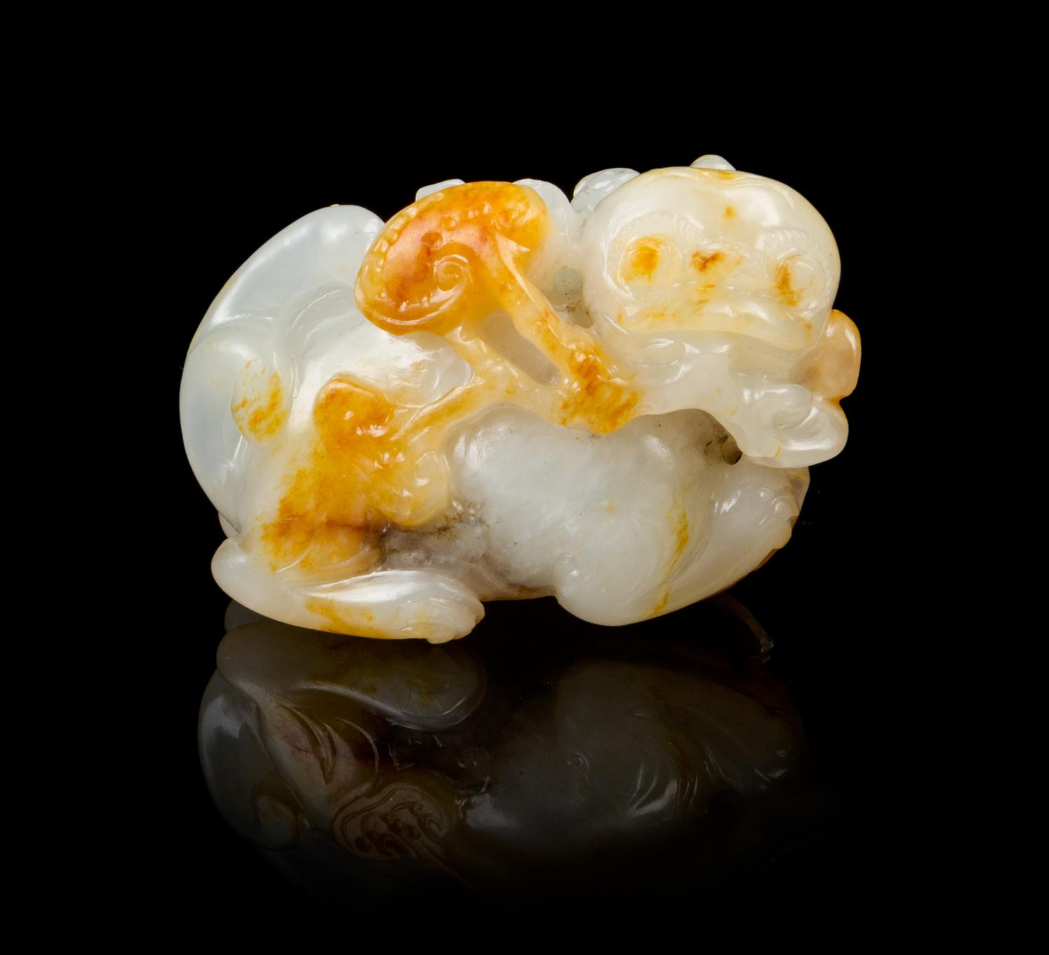 A Chinese White Jade Toggle 18TH/19TH CENTURY Width 1 7/8 inches. — 18TH/19TH CENTURY