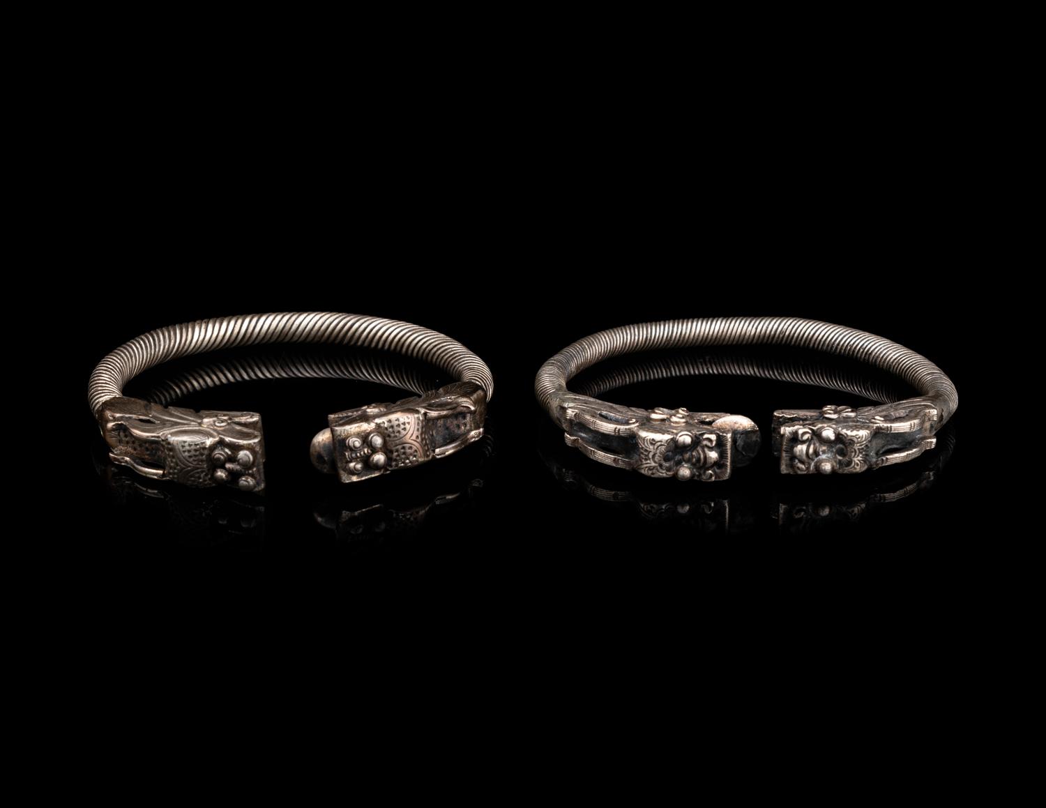 A Pair of Chinese Silver 'Dragon' Bangles