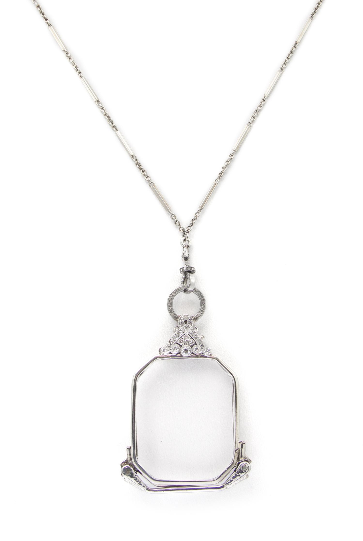 An Art Deco White Gold, Platinum and Diamond Lorgnette with Longchain, 16.90 dwts.
