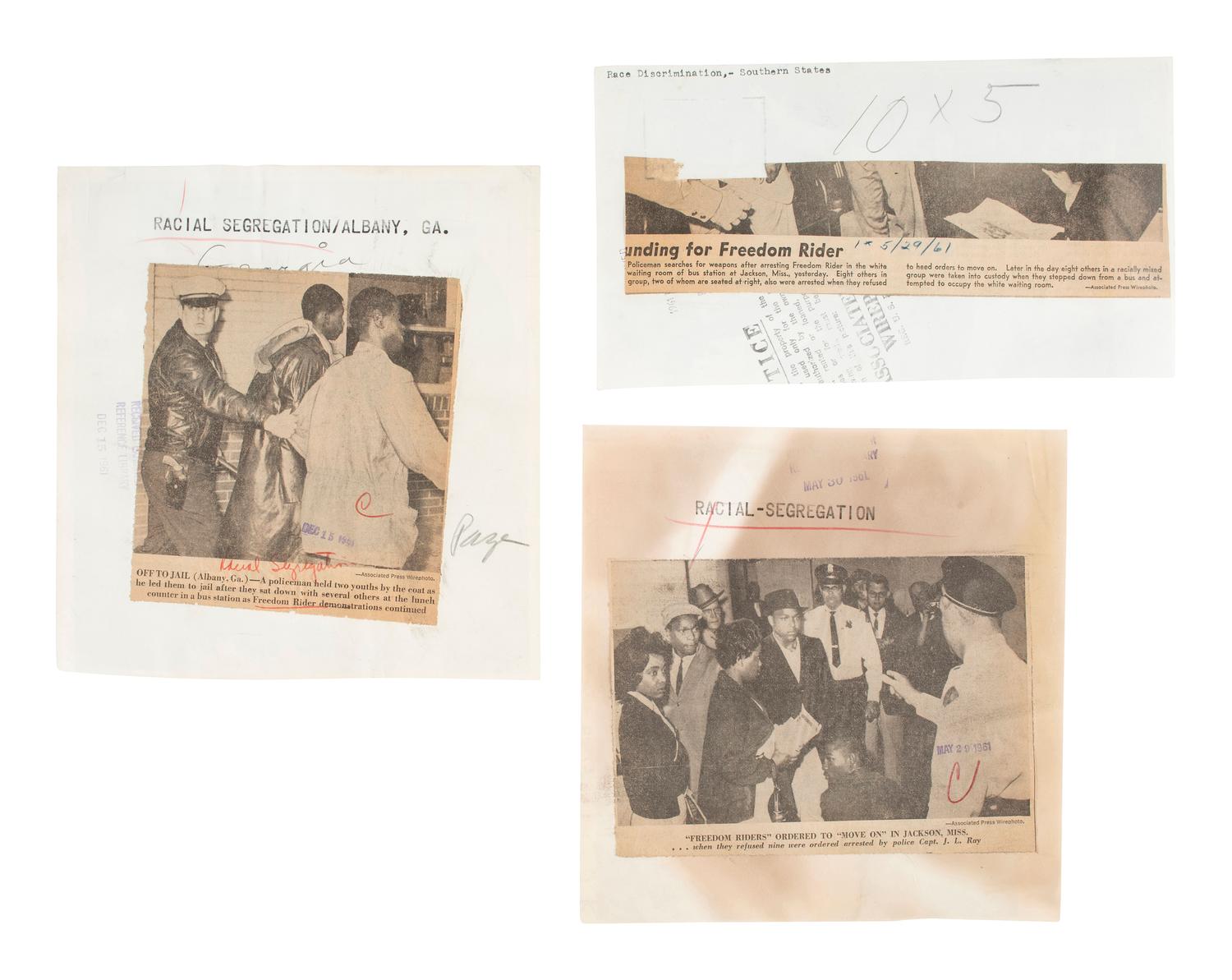 [CIVIL RIGHTS]. A group of 3 press photographs documenting Freedom Riders in Jackson, MS, and Albany, GA. May-December 1961.