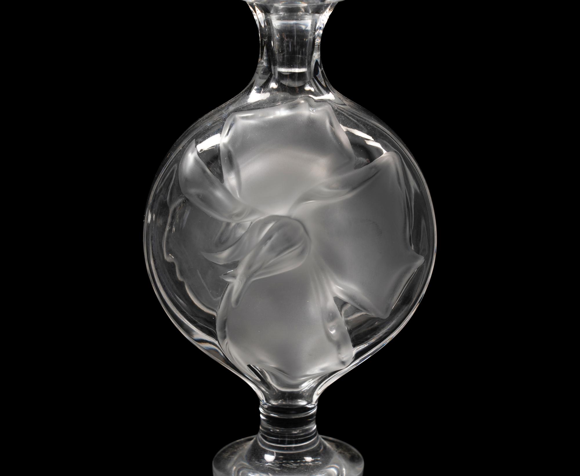 A Group of Four Lalique Dresser Articles