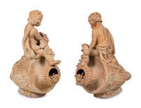 A Pair of Terra Cotta Putti Ornaments