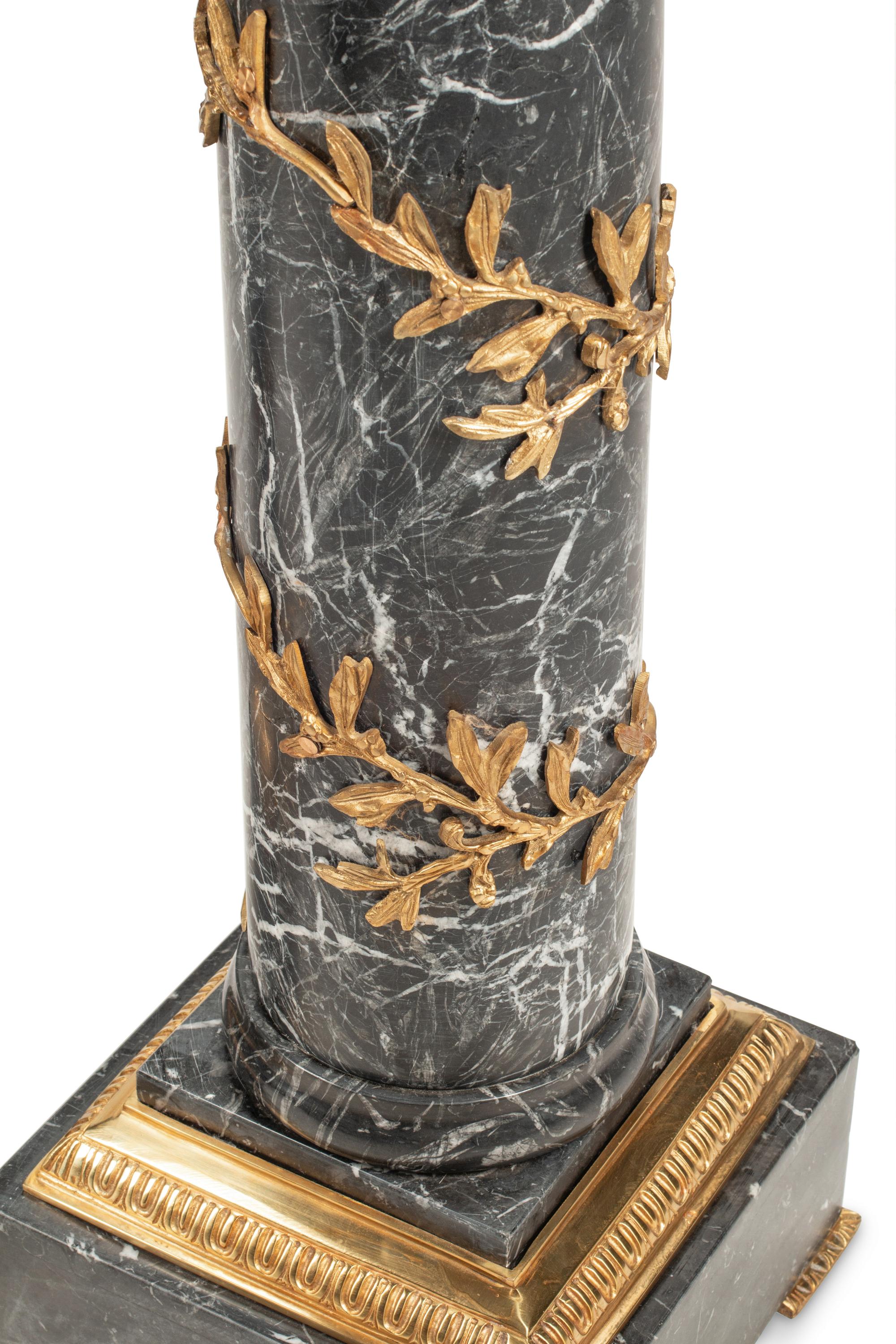 A Pair of Continental Gilt Bronze Mounted Marble Pedestals