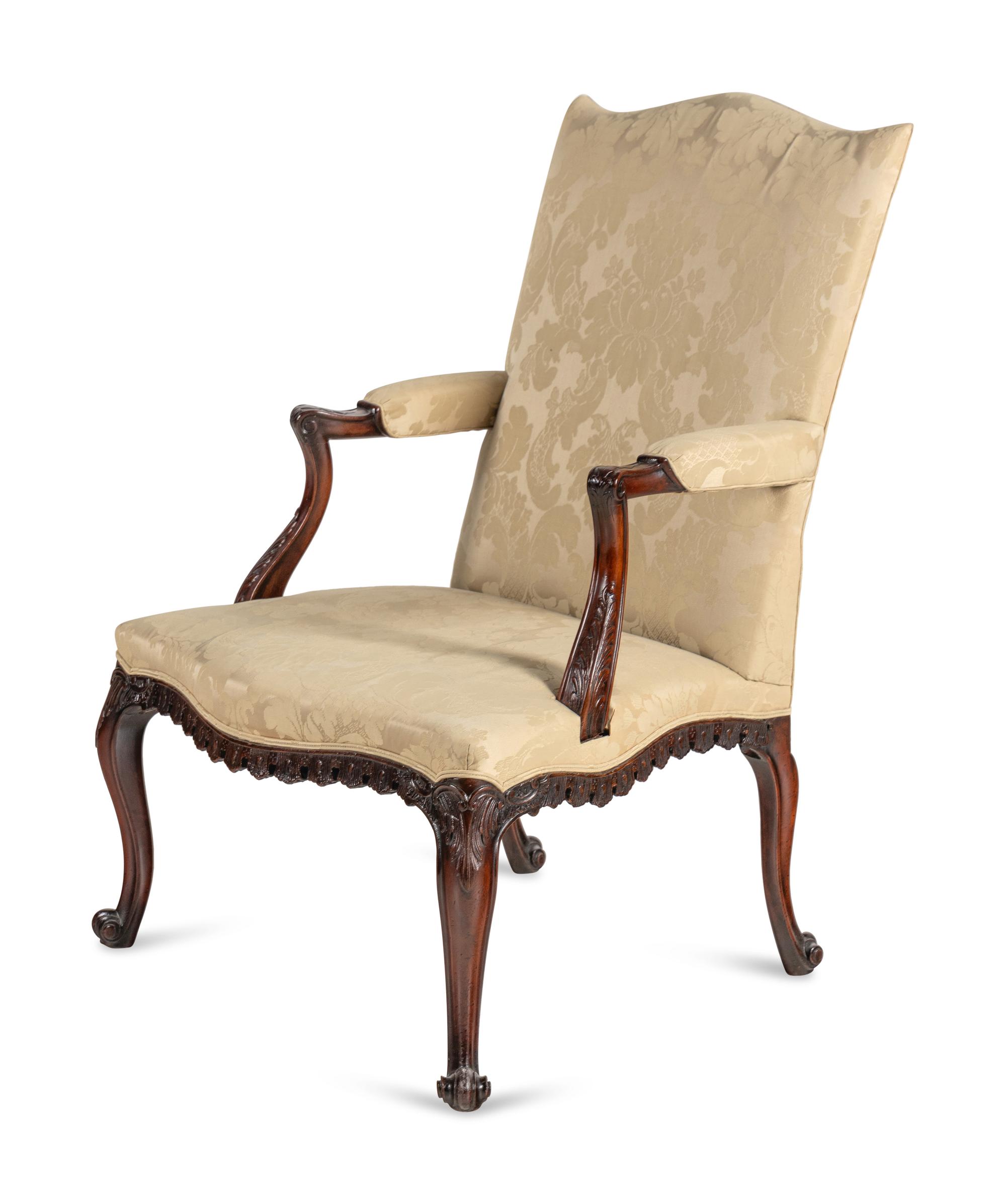 A George III Carved Mahogany Library Chair