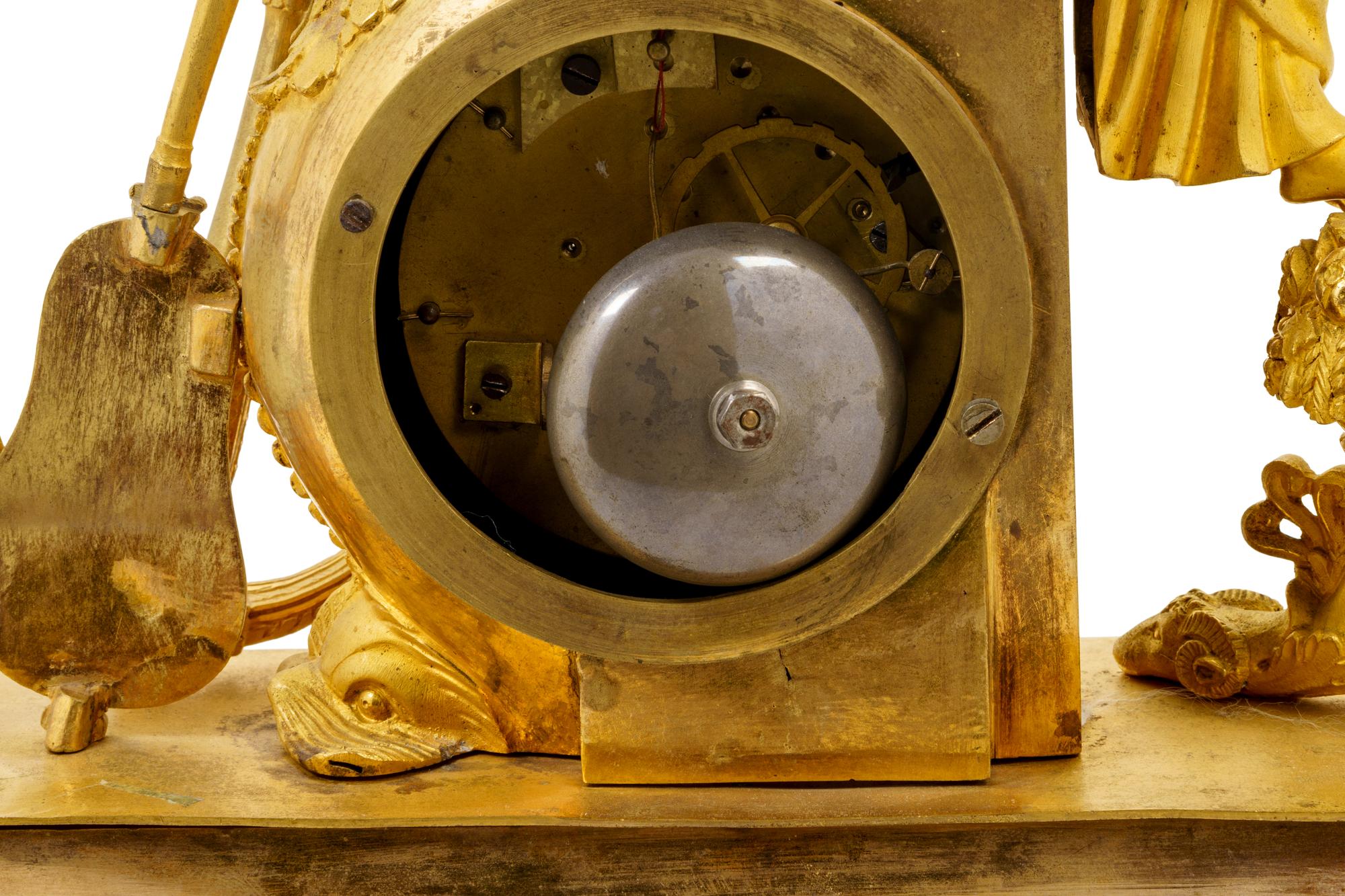 An Empire Gilt Bronze Figural Mantel Clock