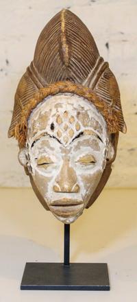 A Baule Style Painted Mask. Height overall 14 inches.