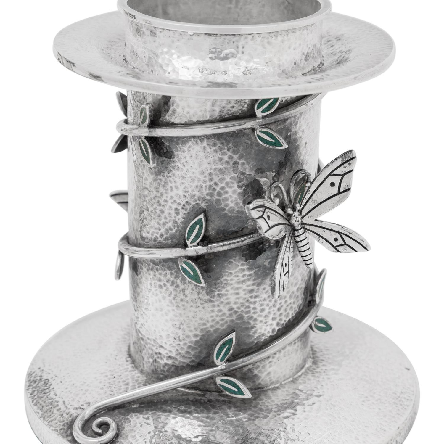 A Set of Three Mexican Silver Graduated Candlesticks