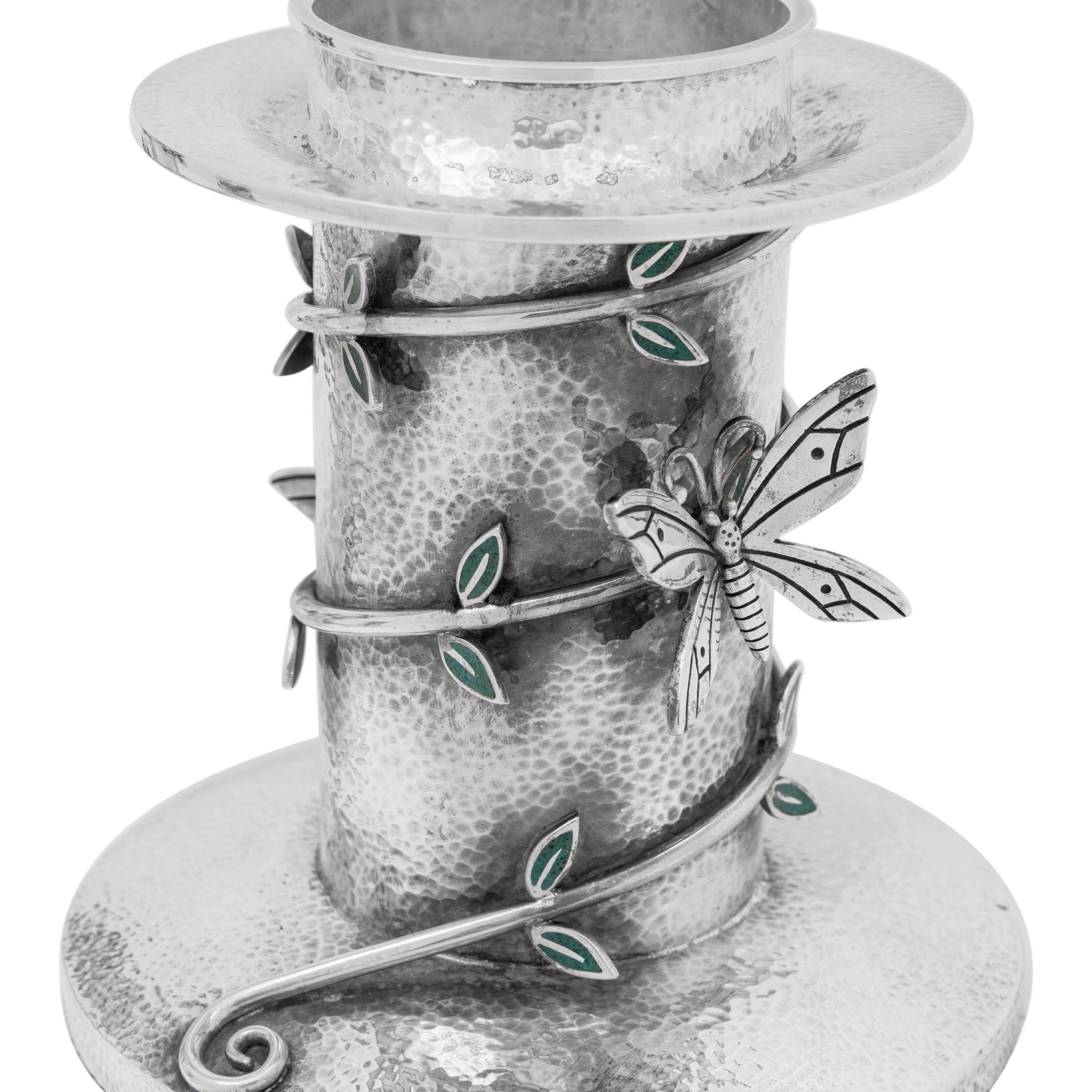 A Set of Three Mexican Silver Graduated Candlesticks