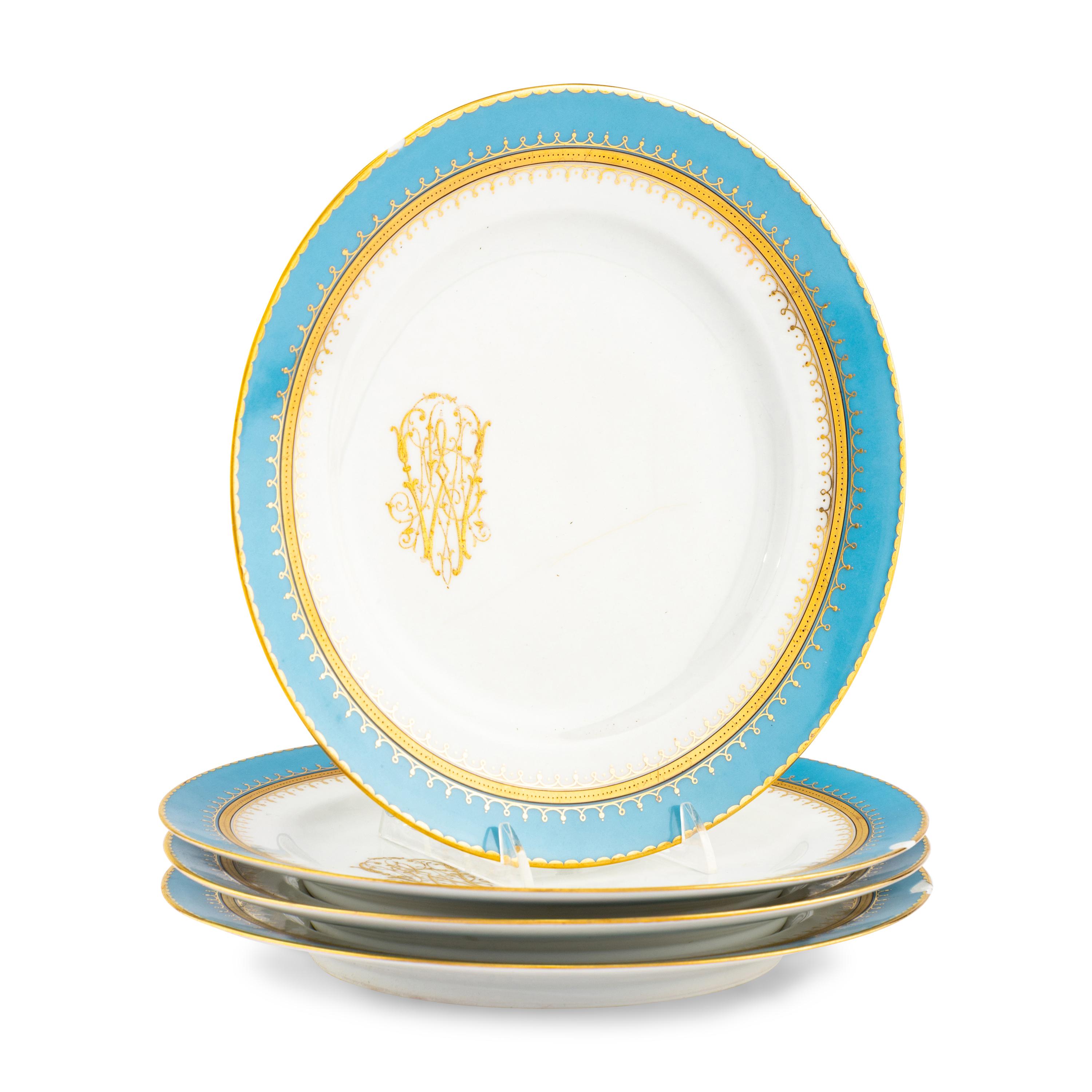 A Set of Four Pirkenhammer Porcelain Plates