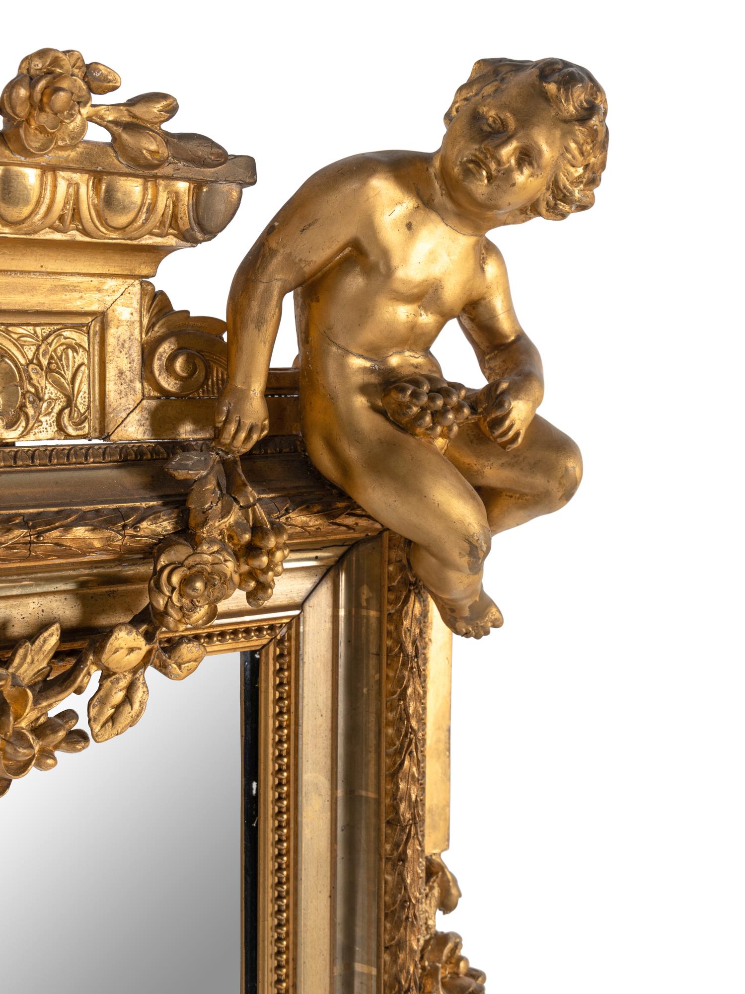 A Continental Giltwood Overmantel Mirror