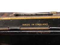 A Collection and Paint Decorated and Lithographed Advertising Tins and Banks