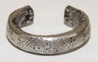 A Silver Bangle Diameter of exterior 2 1/2 inches.