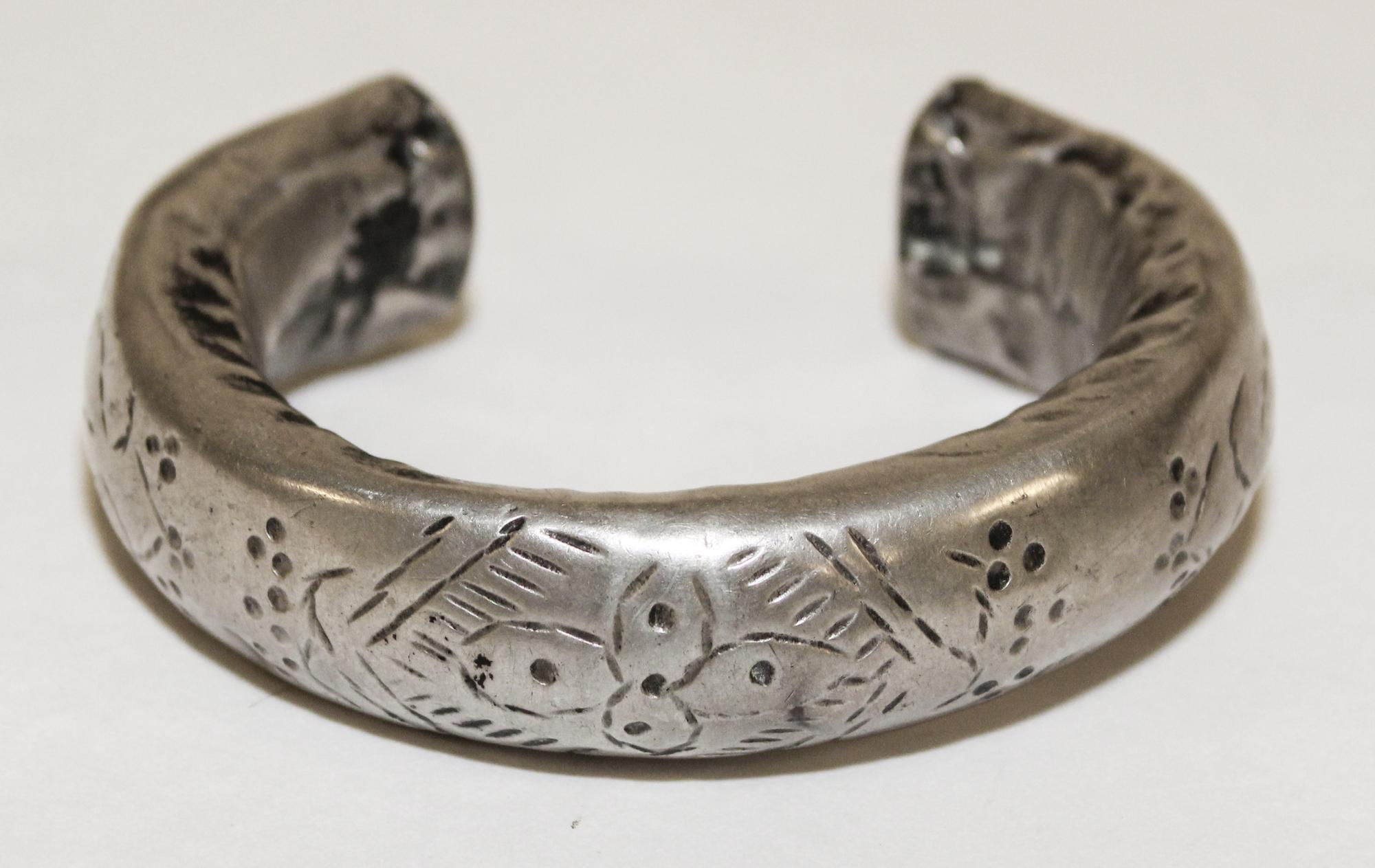 A Silver Bangle Diameter of exterior 2 1/2 inches.