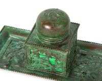 A Group of Arts and Crafts Style Bronze and Glass Desk Articles
