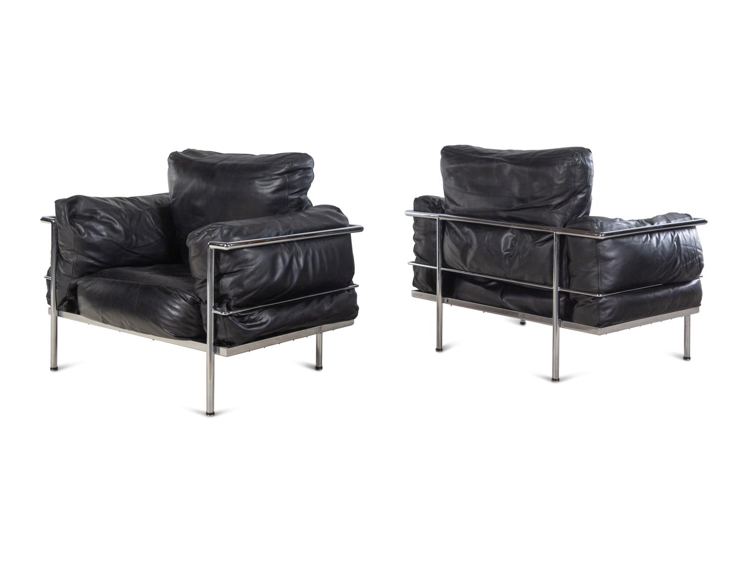 A Pair of Leather Upholstered Chrome Lounge Chairs in the Style of Le Corbusier