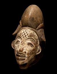 Four Punu Wood Masks