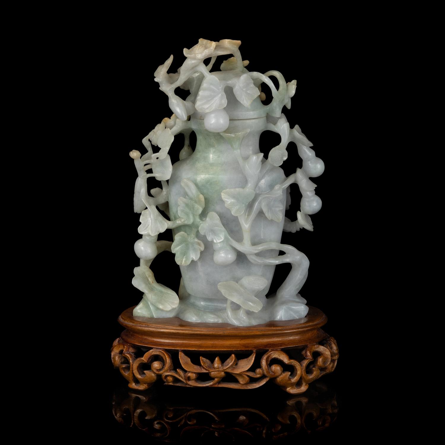 A Chinese Carved Openwork Jadeite Vase and Cover, Qing Dynasty 清 鏤雕翡翠賞瓶