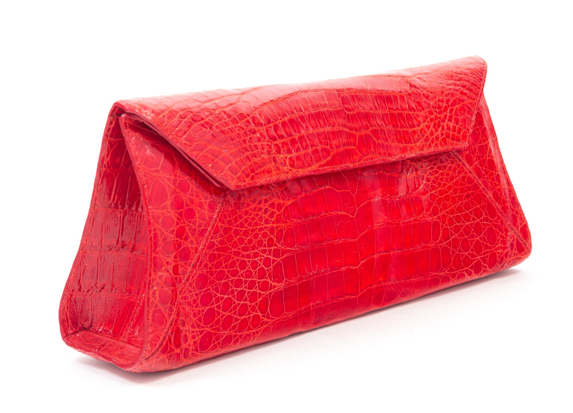 A Nancy Gonzalez Red Crocodile Clutch, 10.75" x 4.5" x 2".