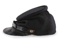 [CIVIL WAR]. A collection of items attributed to Thomas W. Johnson, Co. K, 4th Delaware Infantry, incl. frock coat, cap, belt rig, and cartridge box.